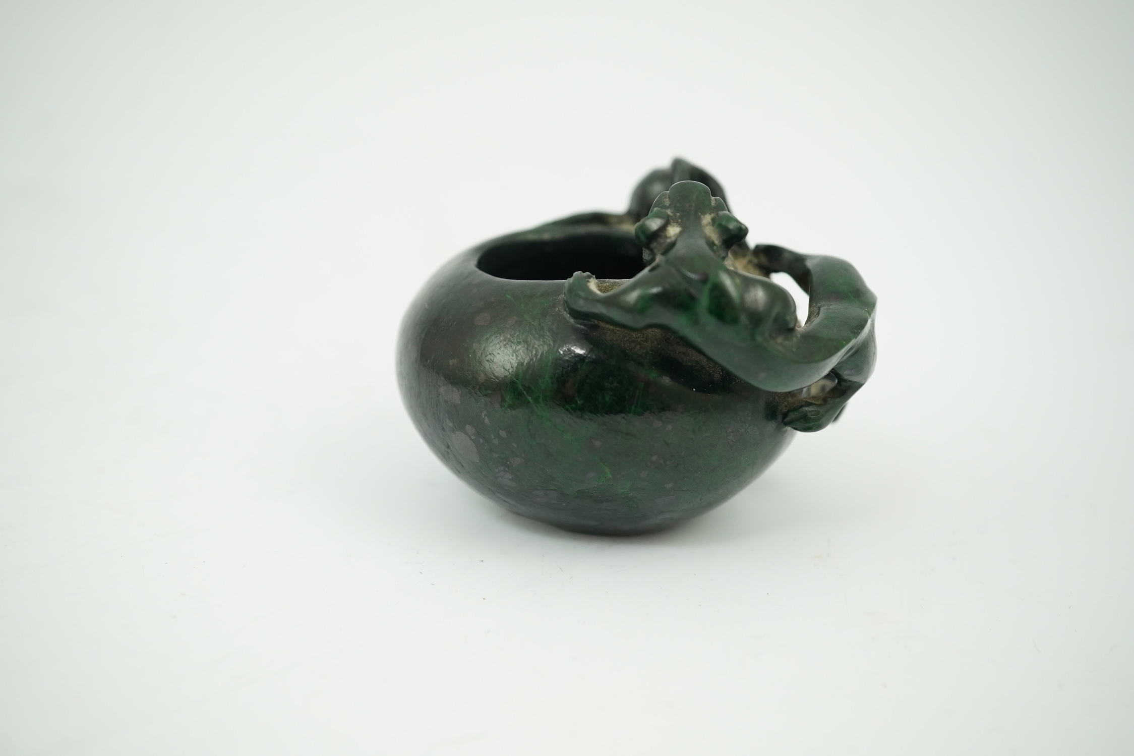 A Chinese dragon carved green hardstone brushwasher, 5cm high. Condition - good